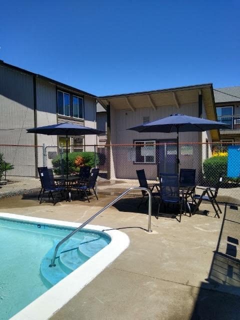 Fenced pool with seating