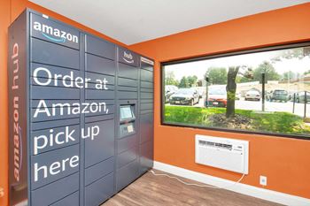 a building with an locker and a pick up window at Mountain Run Apartments, Orem