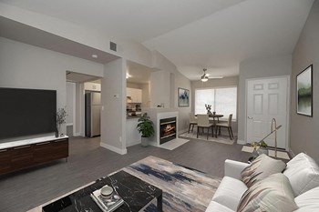 Living room with fireplace near kitchen - Photo Gallery 6