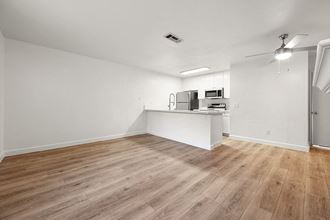 Wood floor in living room near kitchen - Photo Gallery