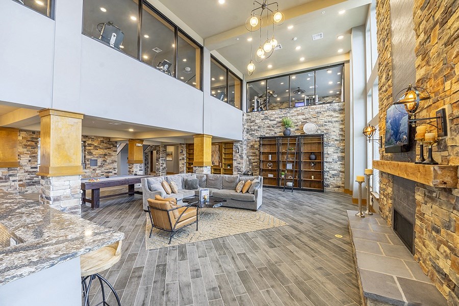 Large clubhouse with seating and high ceilings