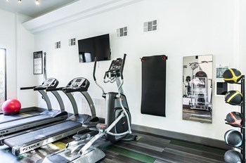 Fitness room with cardio equipment - Photo Gallery 17