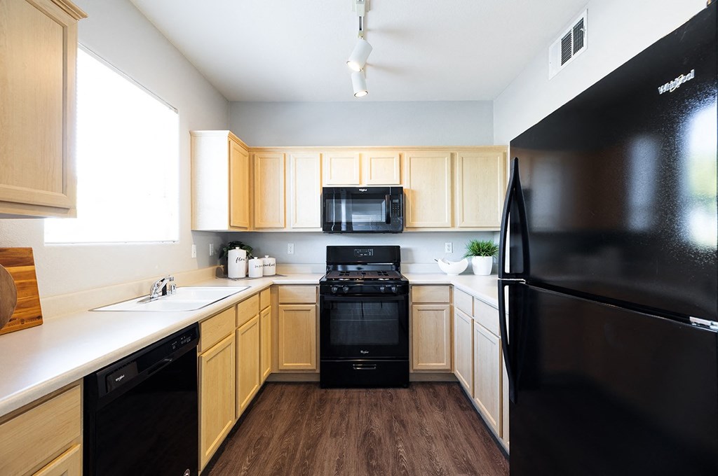 Kitchen with appliances at THE PARKSIDE VILLAS APARTMENT HOMES, Nevada