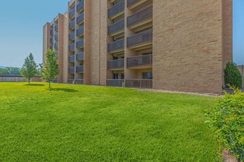 Large grass area by building - Photo Gallery 3