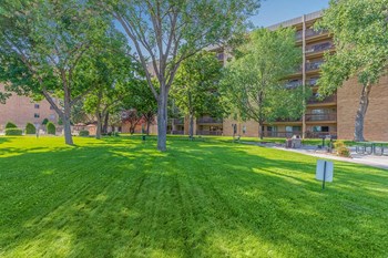 Large grass area by building - Photo Gallery 4