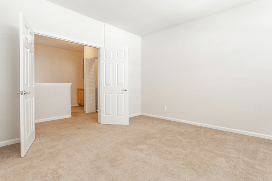 Apartments In Rocklin California - Large Bedroom With Double Doors and Carbet