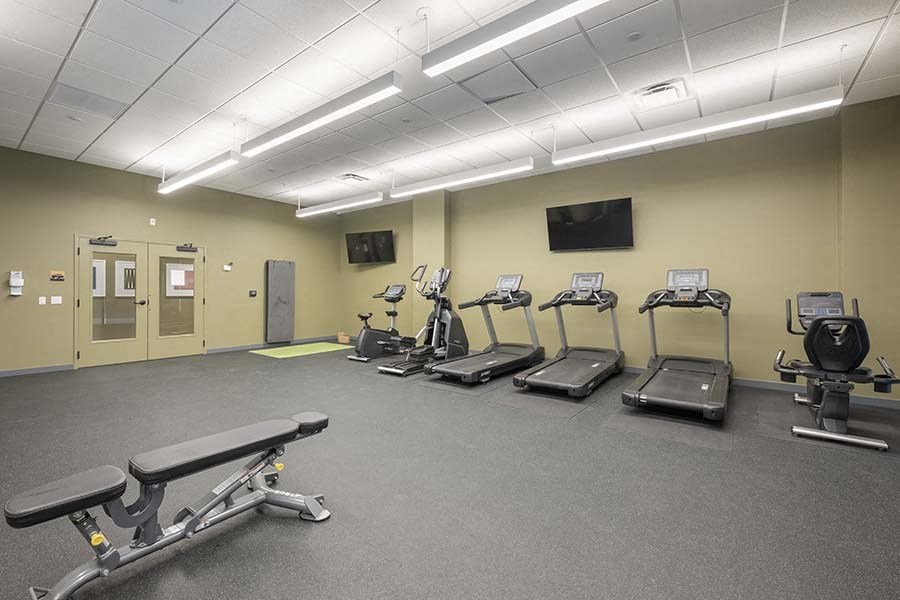 Fitness Center with cardio and strength equipment at FARM BY VINTAGE, MILL CREEK, WA