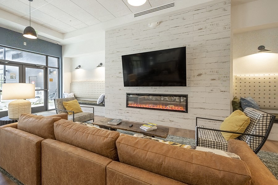 Clubhouse seating by fireplace at FARM BY VINTAGE, Washington