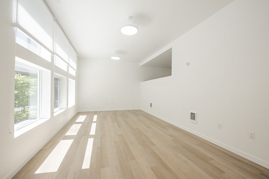 Large room with window and wood floors at FARM BY VINTAGE, MILL CREEK, 98012