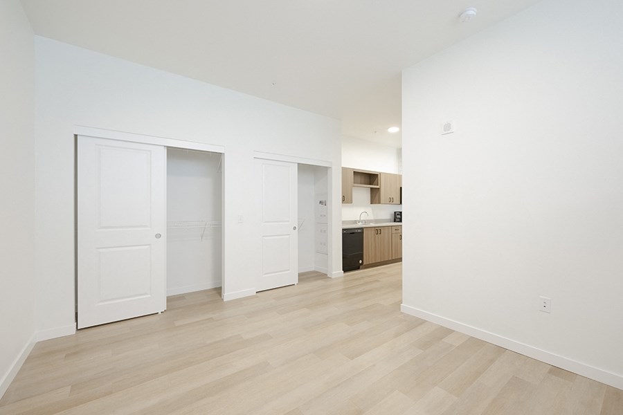 Large room with wood floors and closet at FARM BY VINTAGE, Washington