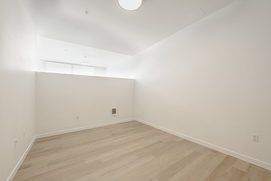 Large room with wood floors at FARM BY VINTAGE, MILL CREEK 