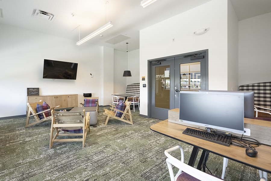 Clubhouse seating near TV at FARM BY VINTAGE, MILL CREEK Washington