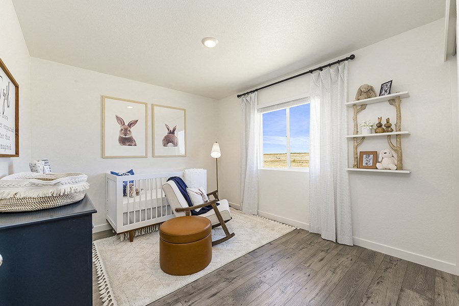 Furnished bedroom with window