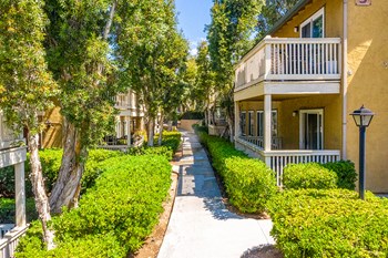 Sidewalk through landscaped buildings - Photo Gallery 5