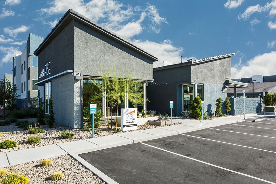 Entry to office with monument sign  and parking 
