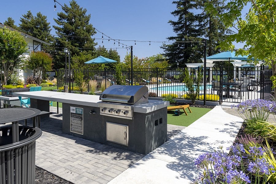 Apartments Near Sonoma State University- The Lenox-  BBQ Pit, Landscaping, Firepit, and Seating Area