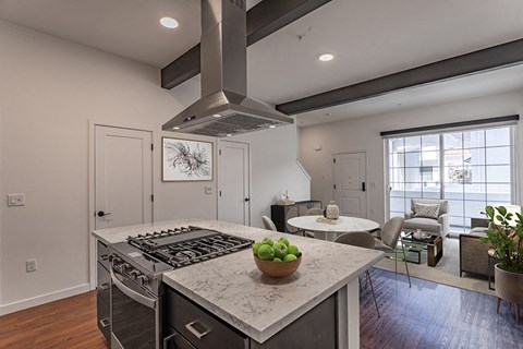 a kitchen with a stove and a counter top
