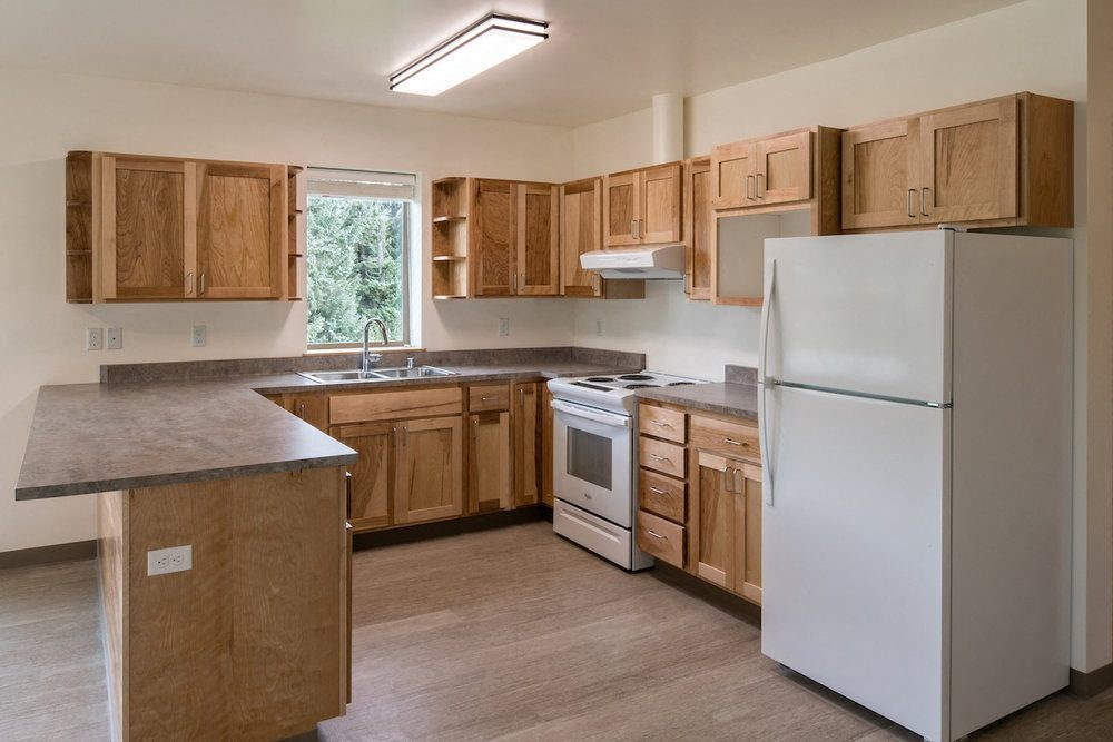 Kitchen with appliances and window at TRILLIUM LANDING, JUNEAU, AK 99801