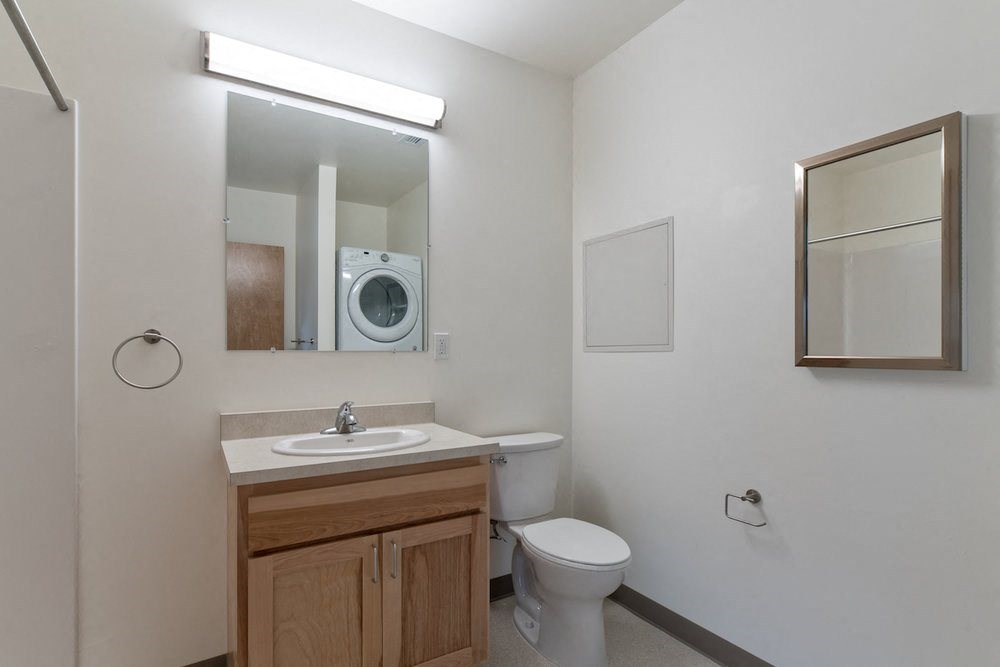 bathroom vanity and mirror at TRILLIUM LANDING, JUNEAU, 99801