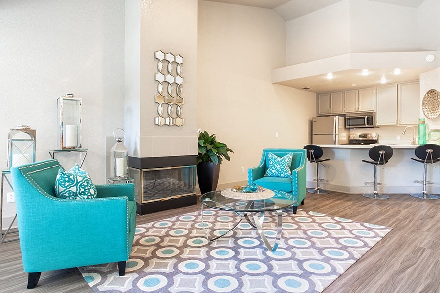 Clubhouse seating near fireplace and kitchen