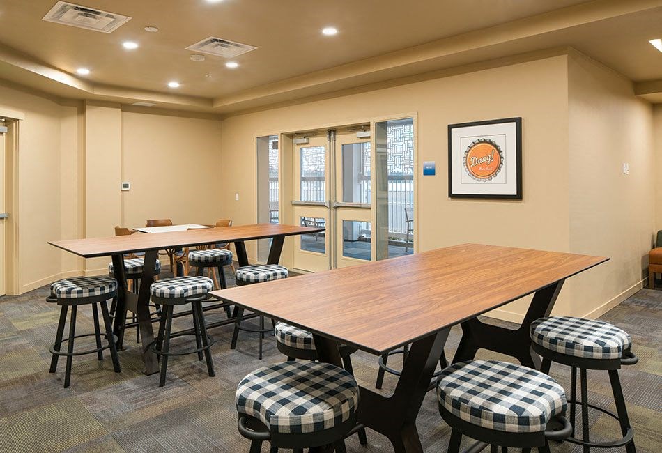 Tables with seating  l Traditions at Federal Way in Washington 