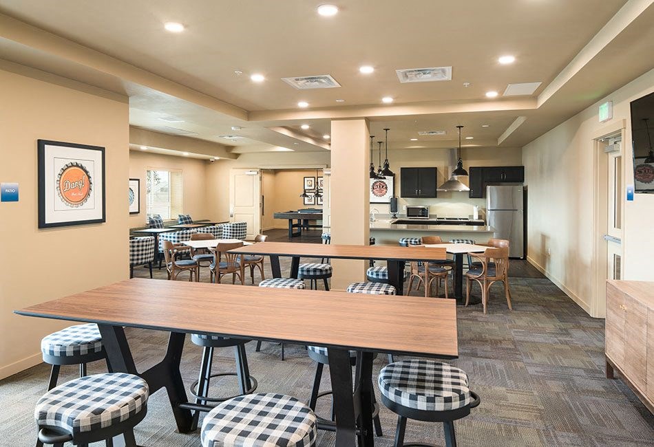 Large table and seating area l Traditions at Federal Way in Washington 