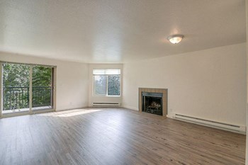 living room with fireplace l Lawton Park Apartments in Seattle Wa - Photo Gallery 4