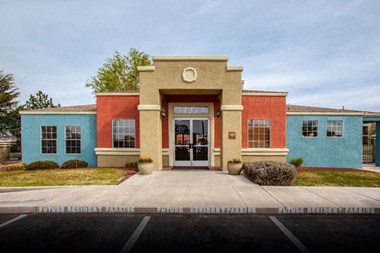 Exterior of leasing office with parking 
