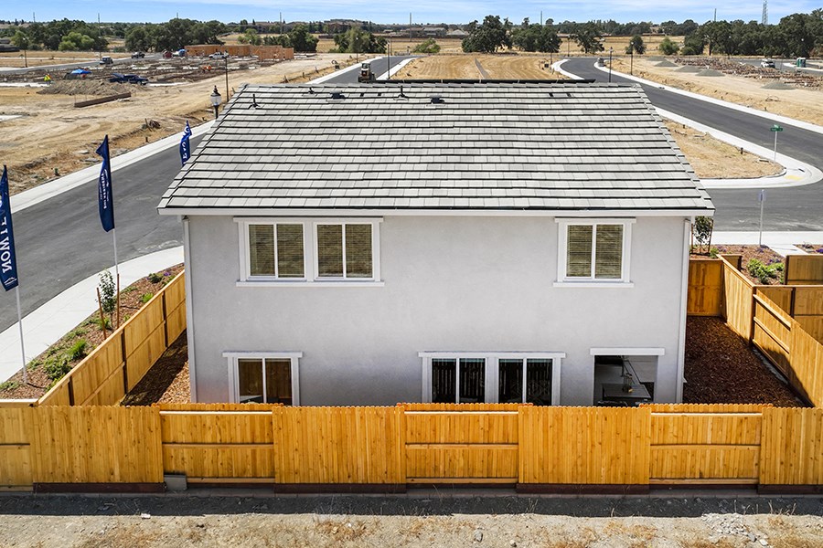 Exterior of building with fenced yard