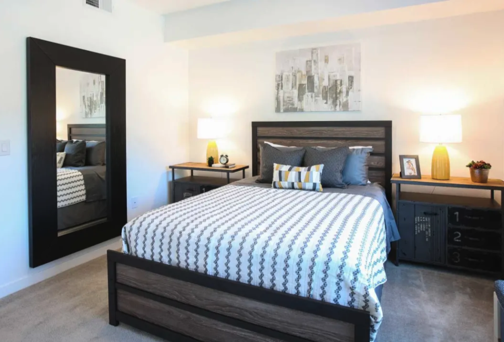 One and Two BR Apartments in Sparks, NV - Fountainhouse at Victorian Square - Bedroom With High Ceiling And Plush Carpet Flooring