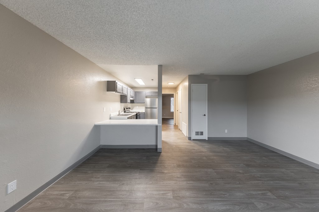 a kitchen and dining area in a 555 waverly unit