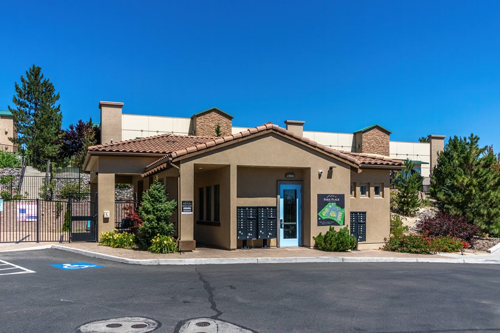 a building with a door and a sign in front of it
