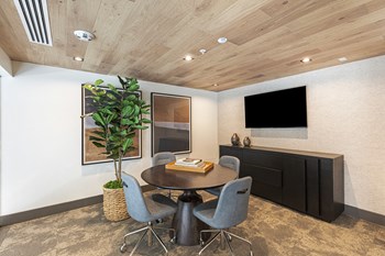 Table and chairs near TV - Photo Gallery 12