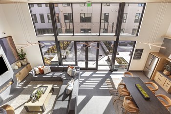 Leasing office seating area near entry doors - Photo Gallery 10