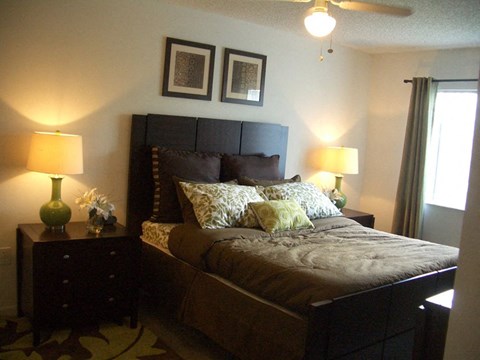 Bedroom with window at Bernwood Trace Apartments, Fort Myers, Florida