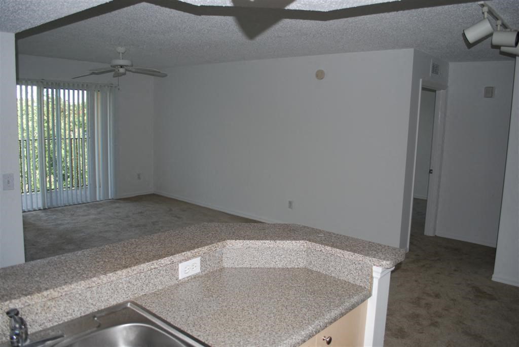 Portofino Apartments kitchen over looking living area