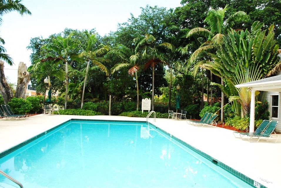 Pool with lounge chairs  at Bay Winds, Miami, FL