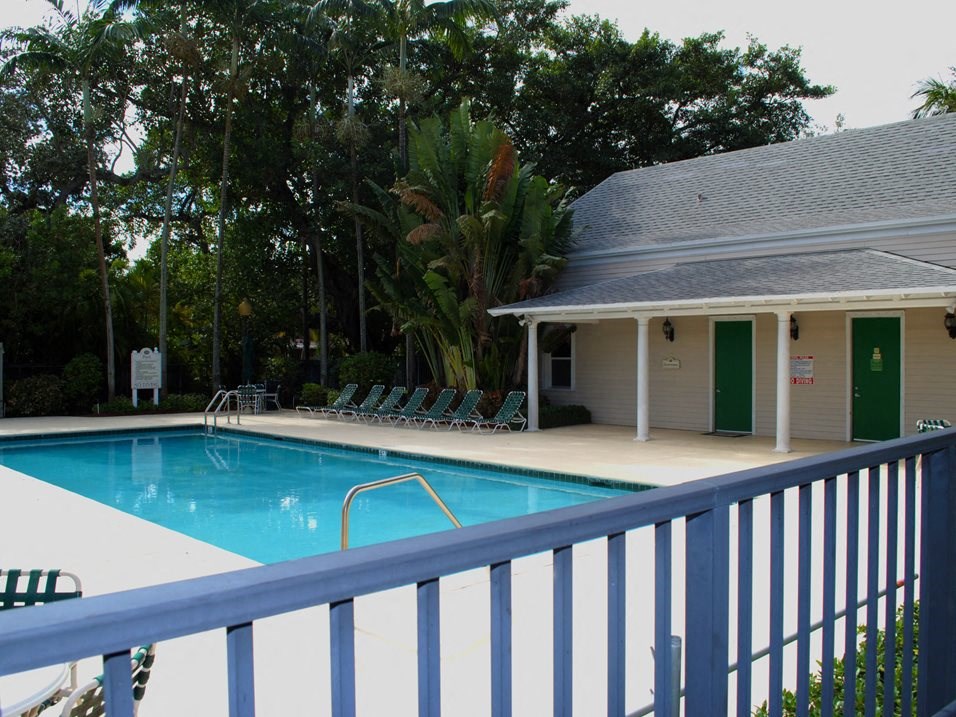 Pool with seating at Bay Winds, Miami, Florida