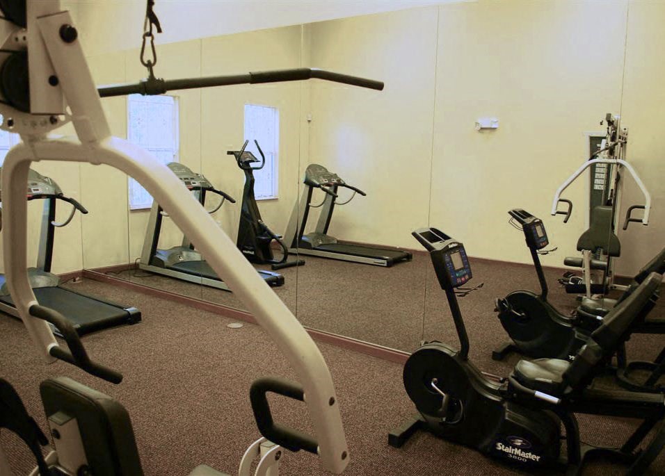 Fitness center with equipment at Bay Winds, Miami, FL