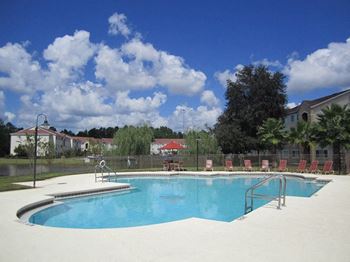 Mission  Pointe apartments resort style pool with lounge chairs
