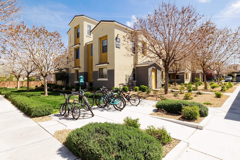 A group of bikes at Everett parked in front of a building. at EVERETT APARTMENT HOMES, Las Vegas, NV, 89113