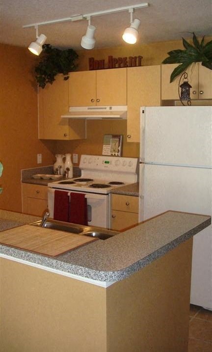 Kitchen with appliances at Clipper Bay, Tampa, FL, 33616