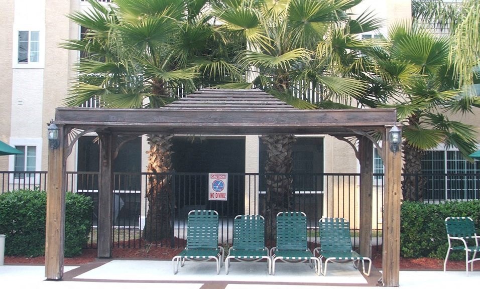 Lounge chairs by pool at Clipper Cove, Tampa, 33616