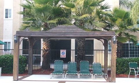 Lounge chairs by pool at Clipper Cove, Tampa, 33616