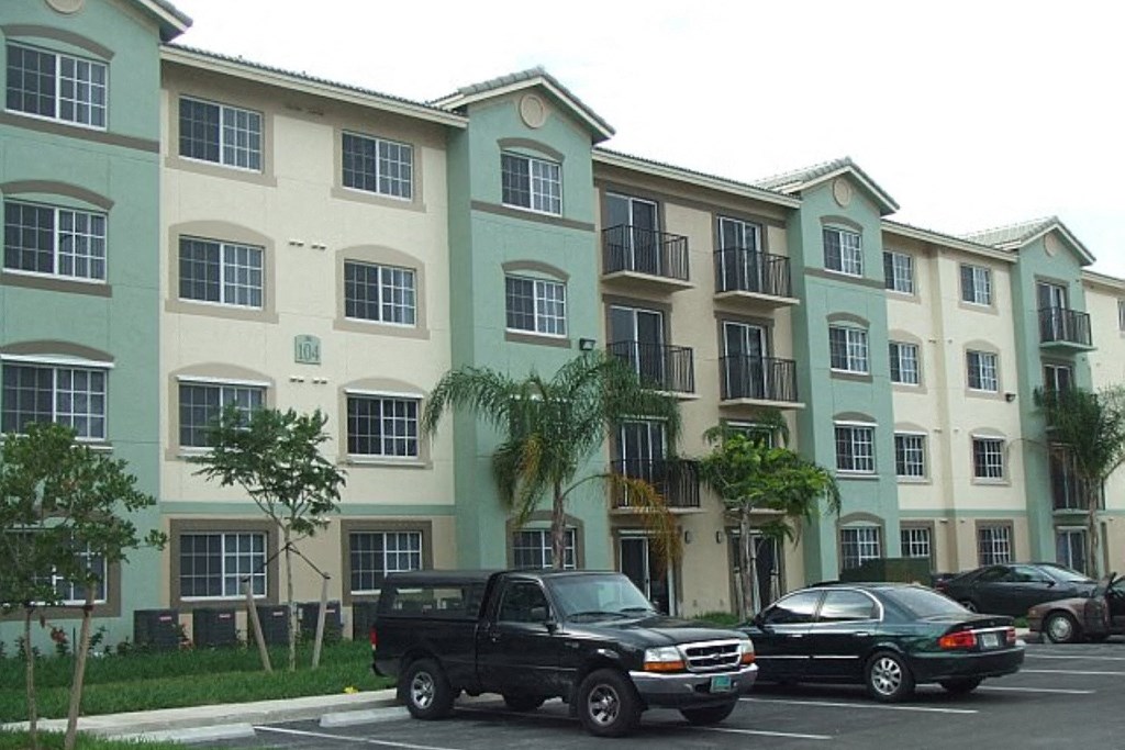 Exterior view of building with parking Exterior view of building with parking at Harbour Cove, Hallandale Beach, FL 33009
