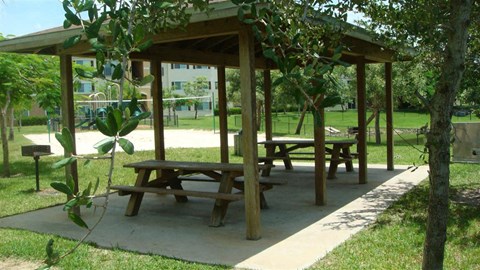 Covered seating by BBQs at Hawk's Landing Apartments, Fort Myers, FL, 33907