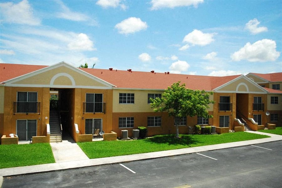 Marbrisa Apartments community exterior and parking area
