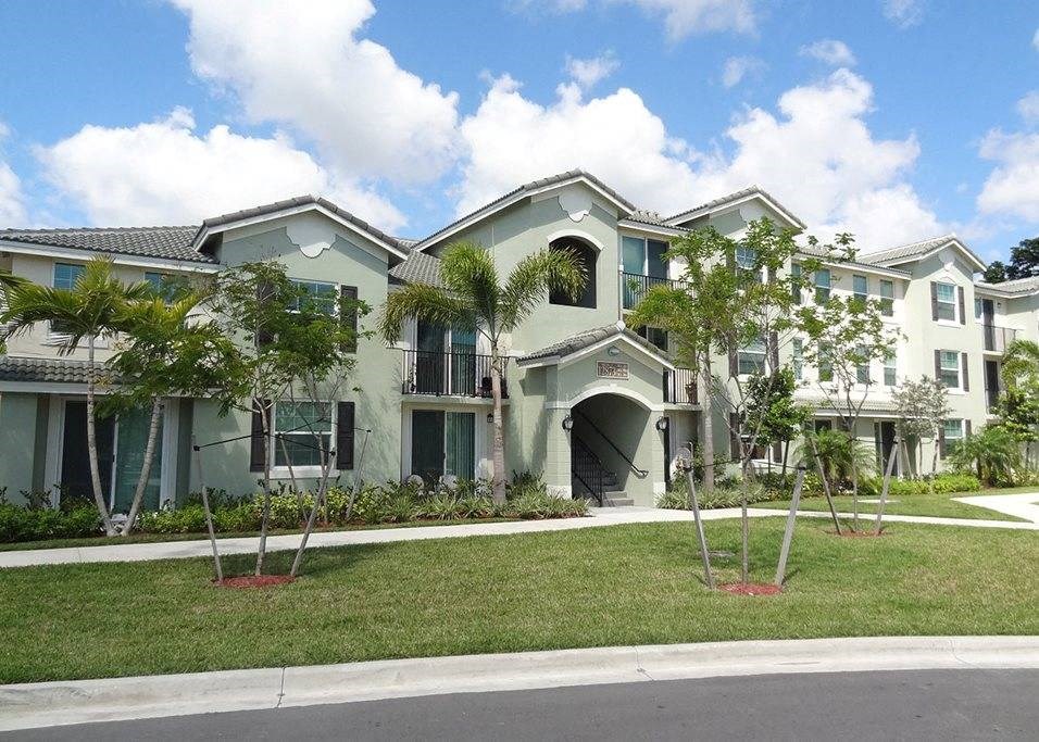 community exterior with sidewalks at Mirabella Apartments, Florida