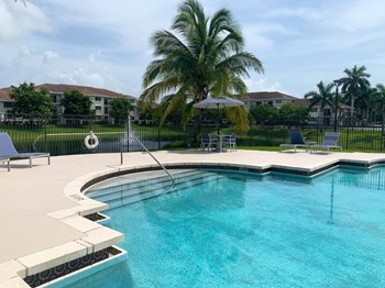Tuscany Place resort style pool and lounge chairs - Photo Gallery 3