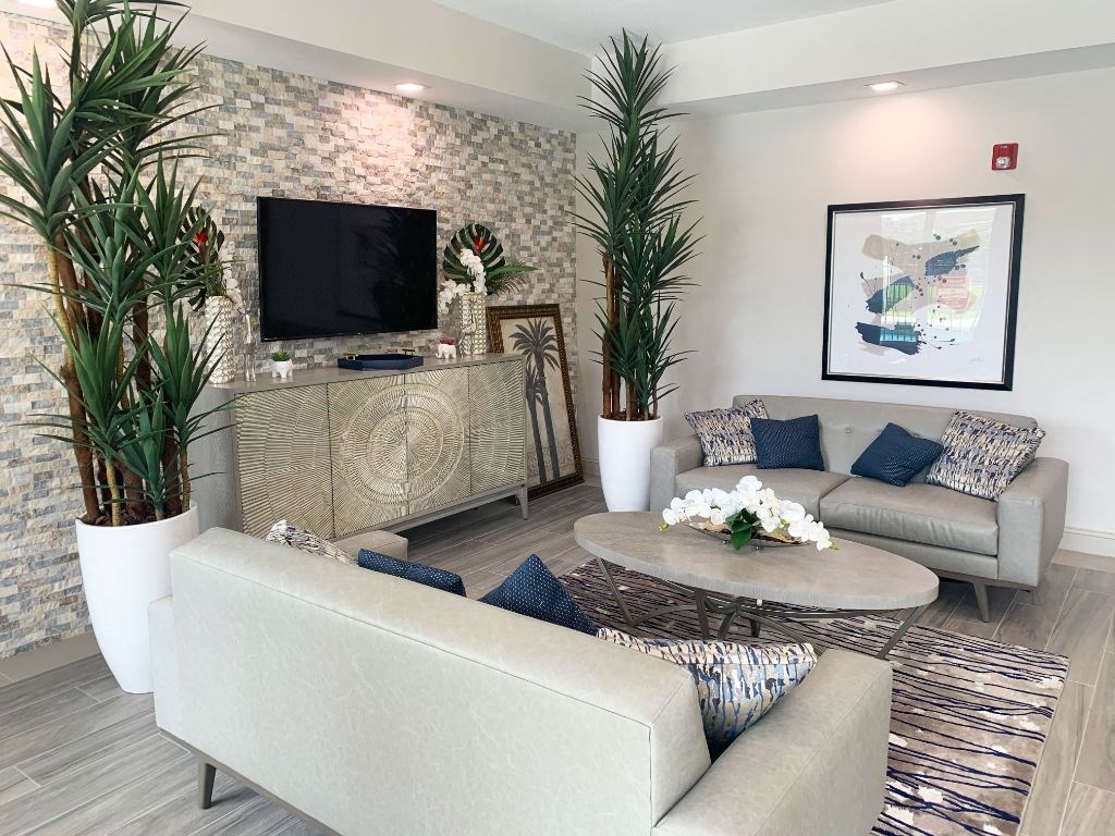 Lounge and seating area with TV at Tuscany Place Apartments, Florida, 33032